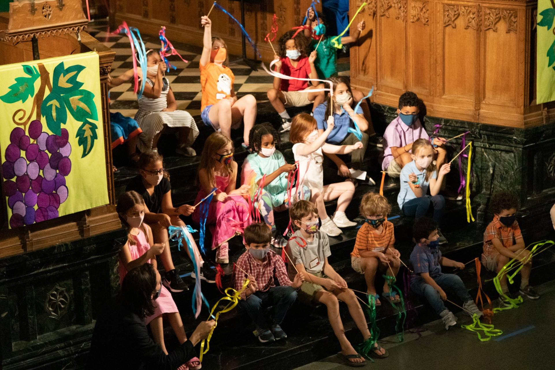 Kids on steps with streamers